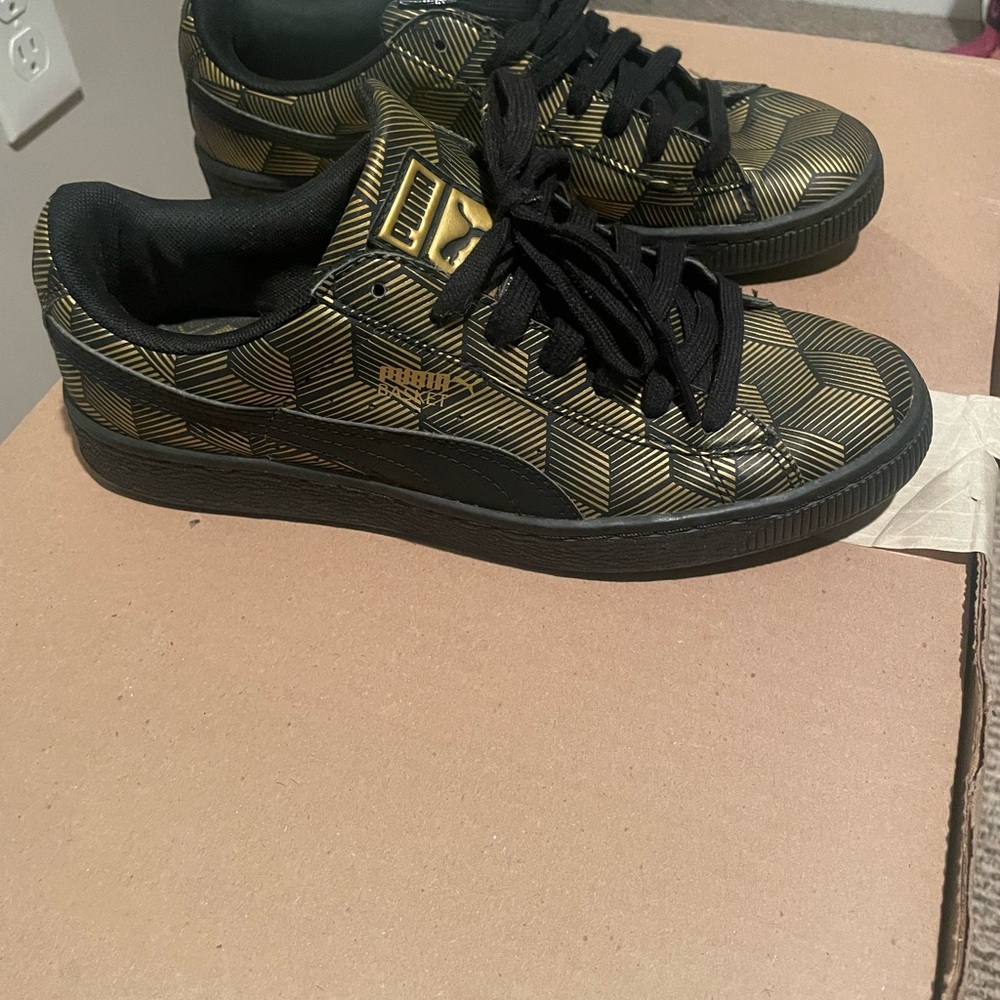 Puma Geometric Black and Gold Sneakers